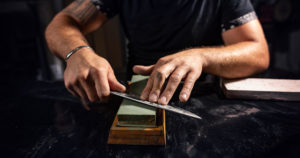 Professional Knife Sharpening Background Image